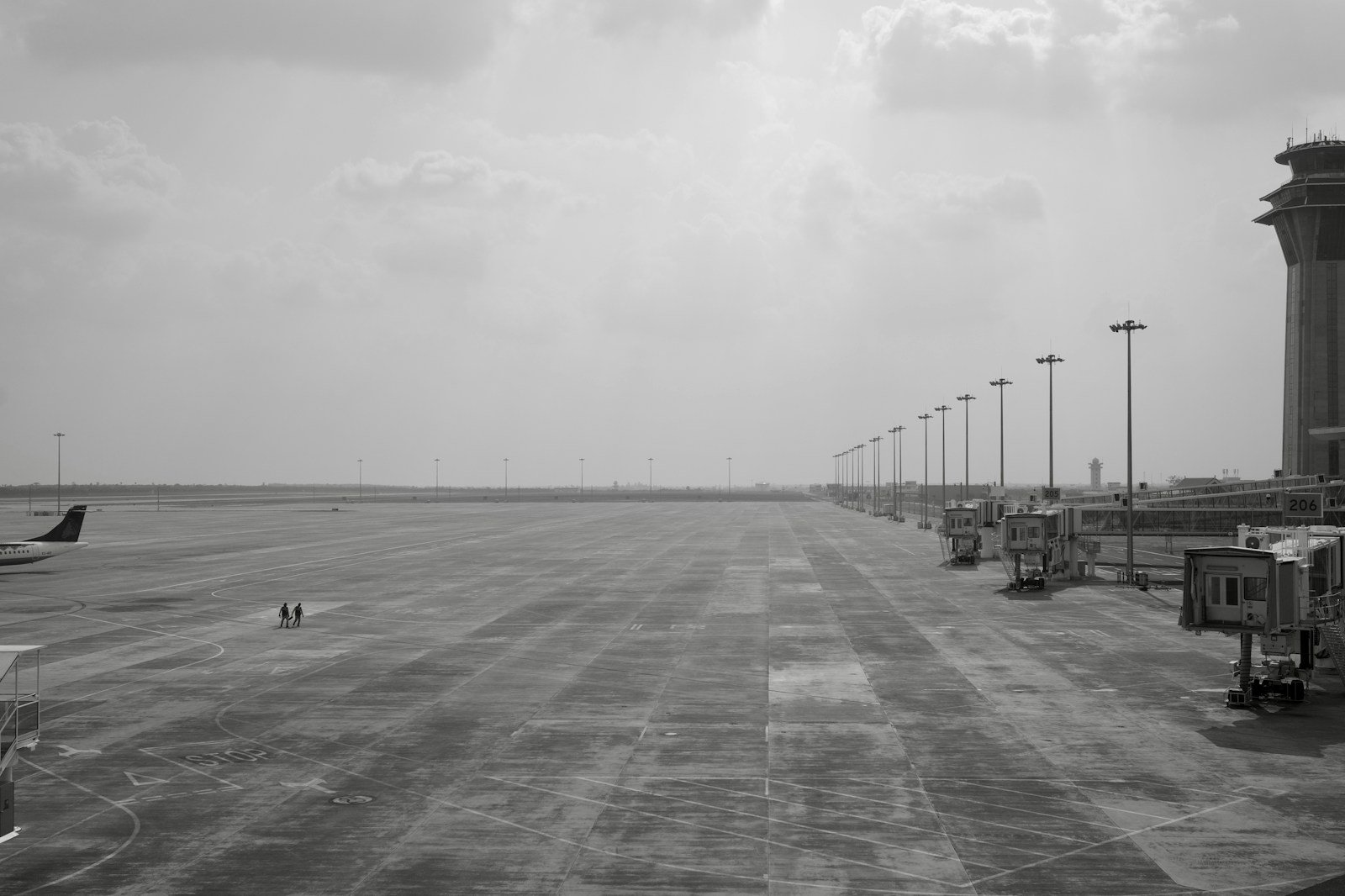 Airport apron, jet bridges and control tower